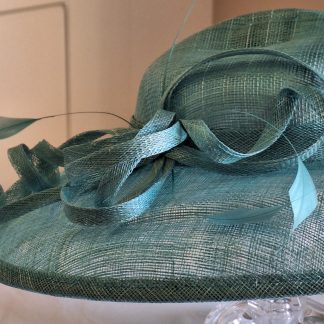 A medium size turquoise hatinator from Hawkins